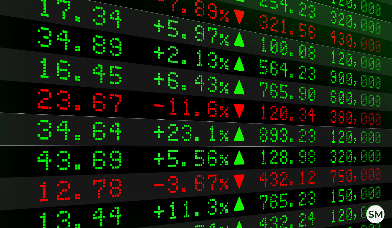 Gráfico de painel digital do mercado financeiro com números e porcentagens em verde e vermelho, indicando alta no Ibovespa.