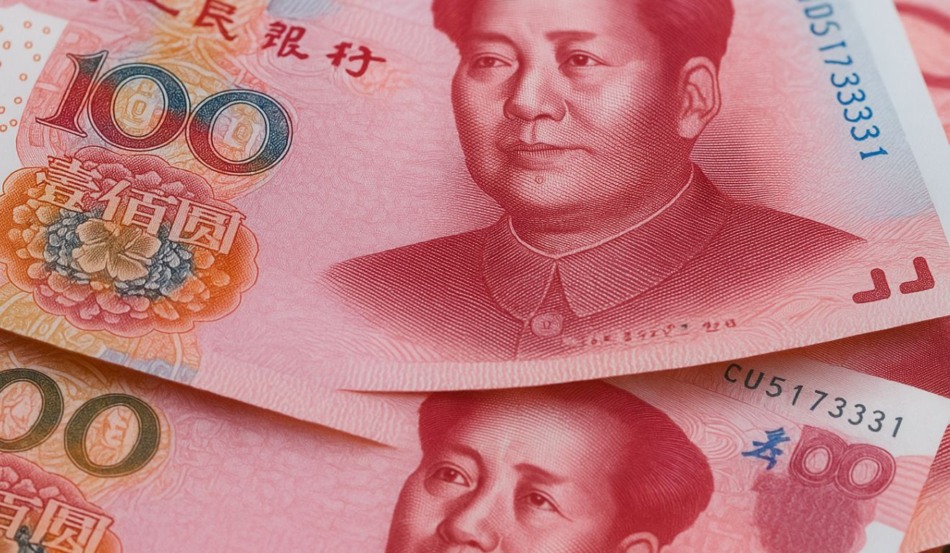 Notas de 100 yuans em Xangai; yuan forte impulsiona moedas emergentes e o real Notas de 100 yuans em Xangai; yuan forte impulsiona moedas emergentes e o real